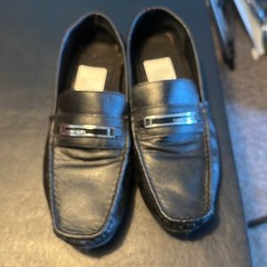 New black Calvin Klein loafers for sale.